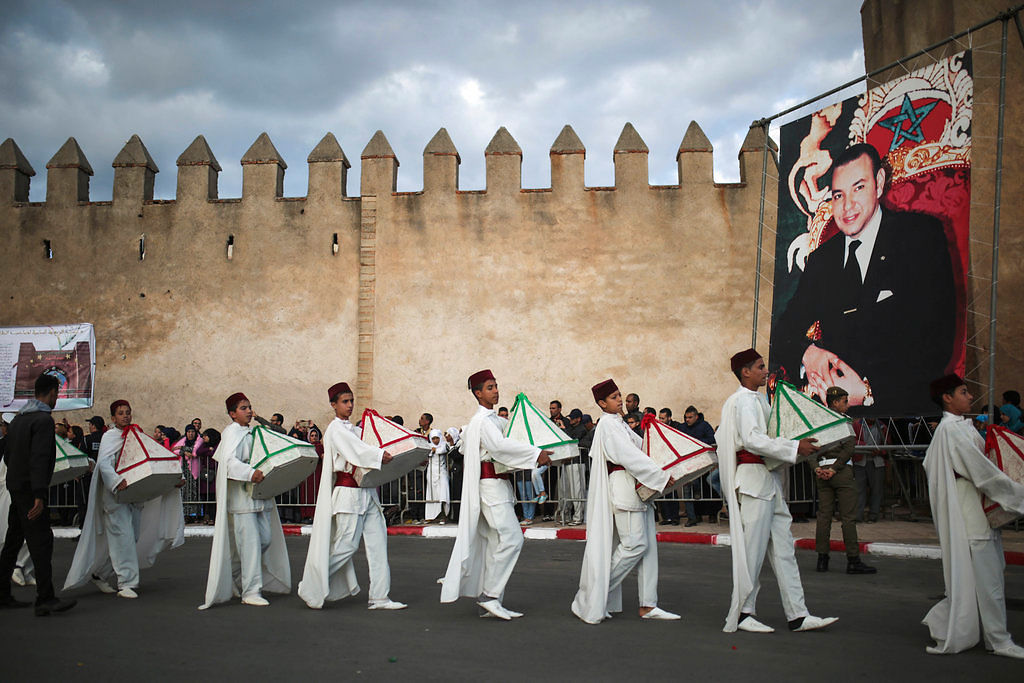 Children take part in an annual parade celebrating the birth anniversary of Prophet Muhammad